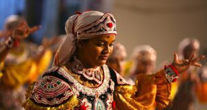 Sri Lanka feiert 2024 touristisches Comeback Sri Lanka: Junge Tänzerin im traditionellen Outfit bei einer torusitsichen Veranstaltung auf Sri Lanka