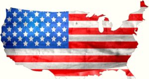 Folgen für Reisewirtschaft nach Trump-Sieg Die USA-Flagge – Stars and Stripes – als Landkarte der Vereinigten Staaten von Amerika