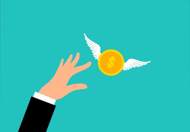 Wofür Geschäftsreisende unterwegs Geld ausgeben: Illustration zeigt eine Hand, die nach einer gelben Münze mit weißen Flügel greift