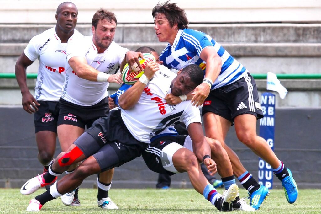 London: Mehrere Männer kämpfen um einen gelben Ball. Das nennt man Rugby. 