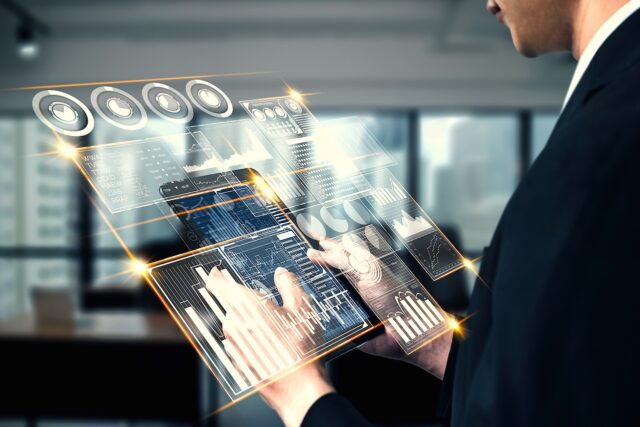 Business Travel der Zukunft Business Travel der Zukunft: Transparentes Tablet mit Symbolen und Zahlen in der Hand einer Person